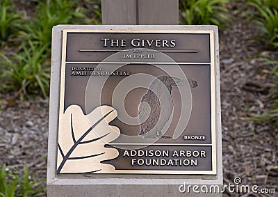 Information plaque, `The Givers` by Jim Eppler and `The Perch` by Scott Shubin, public art at AMLI Residential in Addison, Texas. Stock Photo