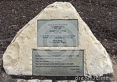 Information plaque `Homeward Bound` by the late Allan Houser on the University of Oklahoma campus in Norman Oklahoma. Editorial Stock Photo