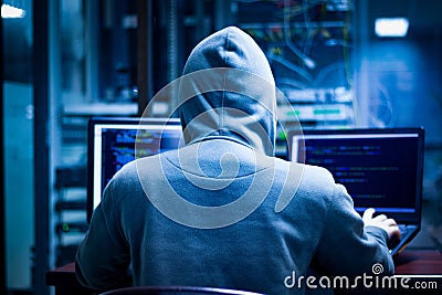 Information thief is hacker Stock Photo