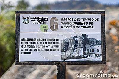 Informative sign explaining the remains of bricks and stones of the arches of the old church of Yungay, Ancash, Peru Editorial Stock Photo