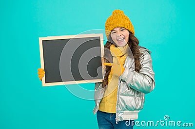 Informing kids community. Kid with blackboard. Promoting product. Child promoting event. Promotion concept. Kid cheerful Stock Photo