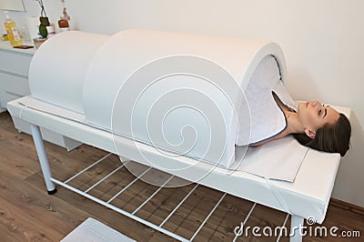 Infrared heat tunnel for slimming body Stock Photo