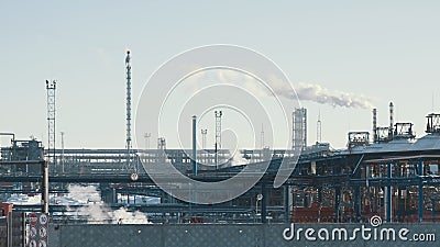Infrastructure of industrial power plant, smoking pipes, pipelines and torch Stock Photo