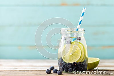 Infused detox water with lime and blueberry Stock Photo