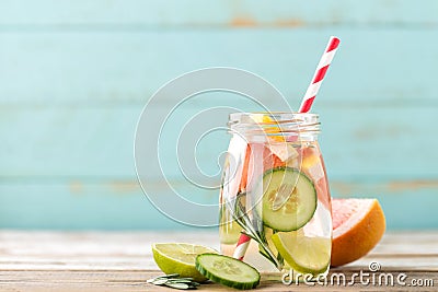 Infused detox water with lime, grapefruit, cucumber and rosemary Stock Photo