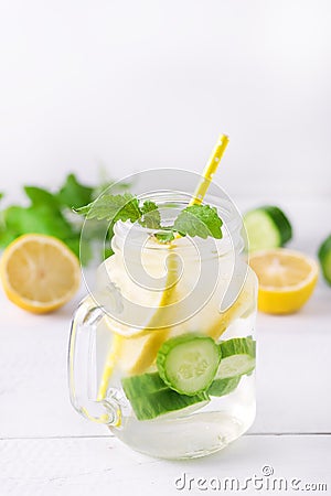 Infused Water With Lemon Cucumber and Mint on Wooden Background Detox Water Vertical Lemonad Stock Photo