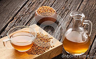 Infusion of yellow fenugreek seeds - Trigonella foenum - graecum Stock Photo