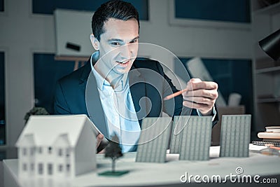 Ingenious designer creating a layout of houses Stock Photo