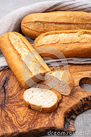 Ingredient for French breakfast, fresh baked crispy baguette white bread Stock Photo