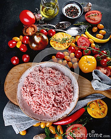 Ingredients for cooking - minced meat, tomatoes and spices Stock Photo