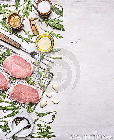 Ingredients for cooking pork with herbs and pepper border ,place for text wooden rustic background top view Stock Photo