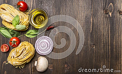 Ingredients for cooking vegetarian pasta on wooden rustic background top view close up border ,with text area Stock Photo