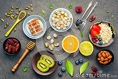 Ingredients for the healthy foods background Mixed nuts, honey, Stock Photo