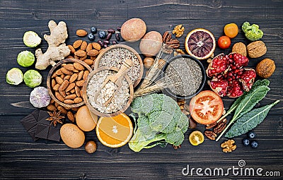 Ingredients for the healthy foods selection. The concept of healthy food set up on wooden background Stock Photo