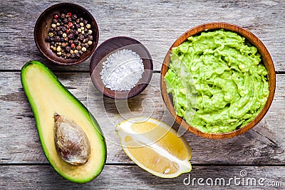 Ingredients for homemade guacamole: avocado, lemon, salt and pepper Stock Photo