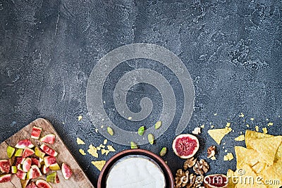 Ingredients layout for baking soft cheese brie with figs, walnuts, pistachios and honey Stock Photo