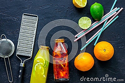 Ingredients for lemonade on black stone background top view Stock Photo