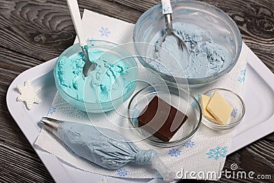 Ingredients for making muffins. Cheese cream of different colors. Ingredients for their preparation Stock Photo