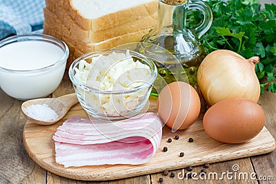 Ingredients for mini quiche with bacon Stock Photo