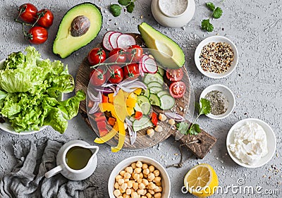 Ingredients for spring vegetable buddha bowl. Delicious healthy food. On a gray background Stock Photo