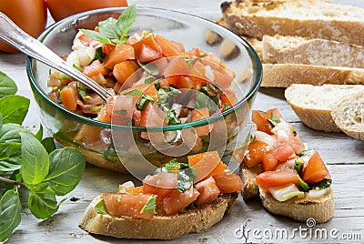 Ingredients to make bruschetta, typical Italian appetize Stock Photo