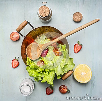 Ingredients vegetarian salad with strawberry, cherry tomatoes, lemon , spices, healthy food, top view Stock Photo