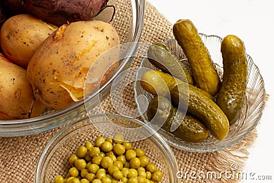 Ingredients for vinaigrette salad. Potatoes, beets, carrots, pickled cucumbers. Step by step salad recipe Stock Photo