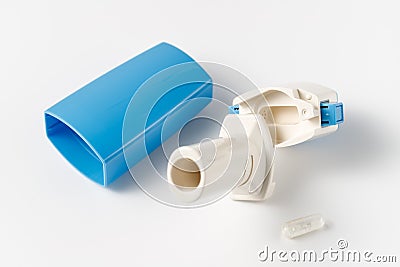 Inhaler or bronchodilator and medical powder capsules for prevention and treatment of bronchitis or asthma Stock Photo