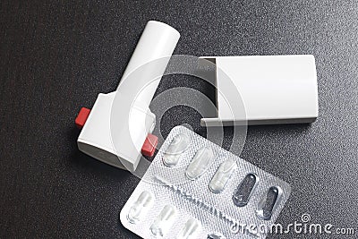 Inhaler and powder for inhalation in capsules. Prevention and treatment of bronchospasm. Stock Photo