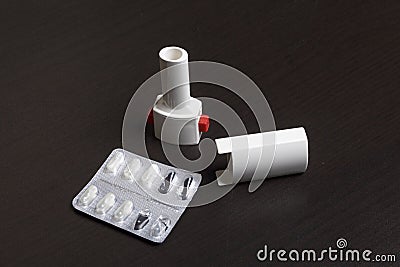 Inhaler and powder for inhalation in capsules. Prevention and treatment of bronchospasm. Stock Photo