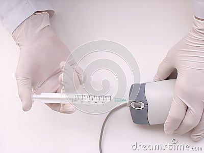 Injecting a mouse Stock Photo