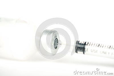 Injection preparation with ampoule and syringe on white Stock Photo