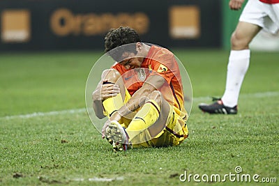 Injured football player - Cesc Fabregas Editorial Stock Photo