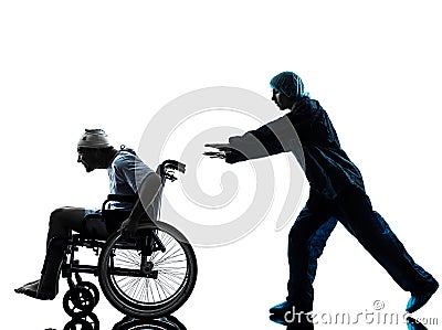 injured funny man in wheelchair escaping away of nurse silhouette Stock Photo