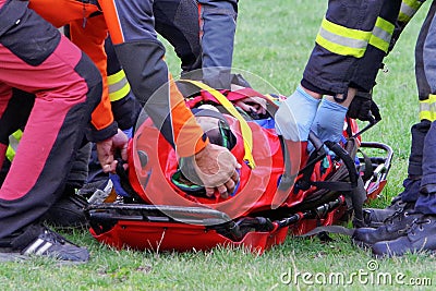 Injured man transported by firemans Editorial Stock Photo
