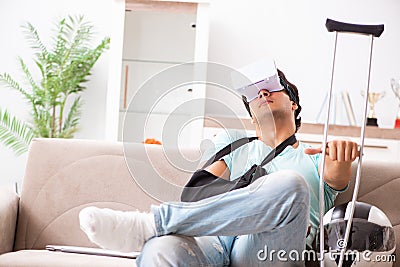 The injured motorbike rider recovering at home Stock Photo