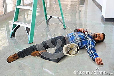 Injured Worker After Falling Stock Photo