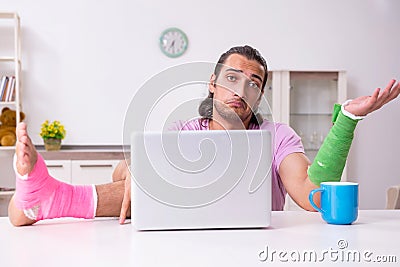 Injured young man at home Stock Photo