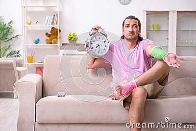 Injured young man at home Stock Photo