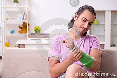 Injured young man at home Stock Photo