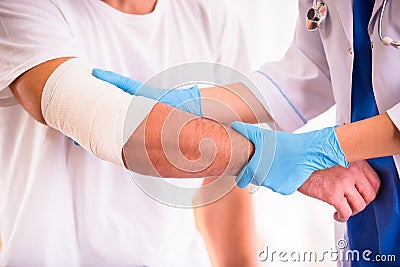 Injury man in doctor Stock Photo