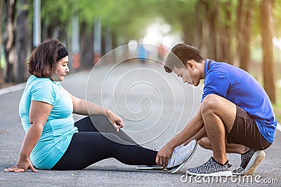 Injury from workout concept : Asian man use hands hold on his an Stock Photo