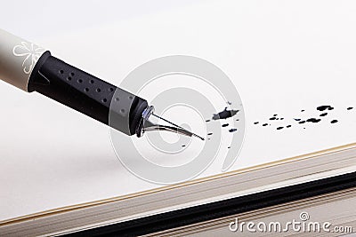 Ink splats with fountain pen Stock Photo