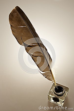 Inkwell and feather Stock Photo