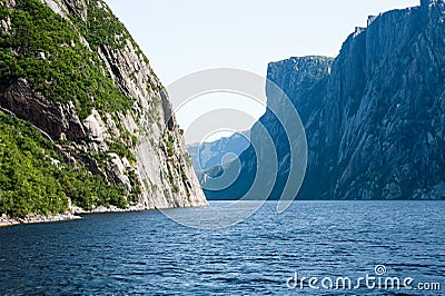 Inland fjord between large steep cliffs Stock Photo