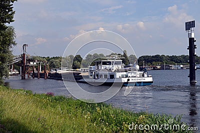 Inland waterway vessel loading sand Editorial Stock Photo