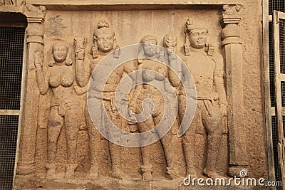 Inlay sculptures in deep Buddhist cave Stock Photo