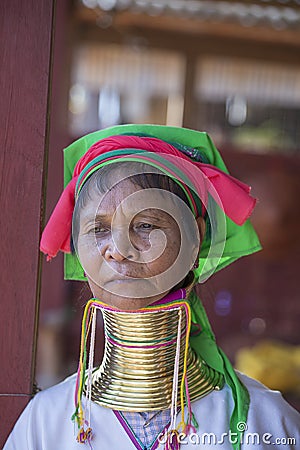 Padaung Tribal woman poses for a photo in Inle lake, Myanmar, Burma The Padaung-Karen long-necked tribe women are minority of Editorial Stock Photo