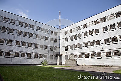 Inner court of abandoned prison jail Stock Photo