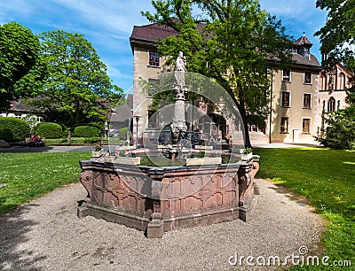 The inner courtyard of the Lichtental Abbey with St. Maryâ€˜s fountain in Baden Baden. Baden Wuerttemberg, Germany, Europe Stock Photo